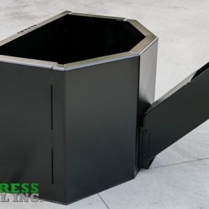 A black, hexagonal Express Steel Manual Concrete Placement Bucket with an angled chute sits on concrete. The green and gray Express Steel Inc. logo appears in the bottom left corner.