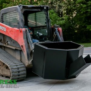 A red Kubota skid steer loader with an Express Steel Manual Concrete Placement Bucket attached is parked on pavement. Trees and a road are visible in the background, with the Express Steel Inc. logo at the bottom left.