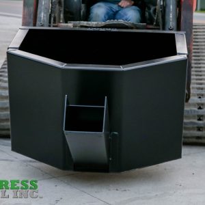 An Express Steel Manual Concrete Placement Bucket, made of black steel, is attached to the front of a skid steer loader on a concrete surface. The Express Steel Inc. logo appears at the bottom left corner of the image.