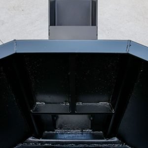 A close-up of an Express Steel Manual Concrete Placement Bucket shows its black steel construction, welded joints, and reinforced panels resting on a light concrete surface. The Express Steel Inc. logo appears in the bottom left corner.