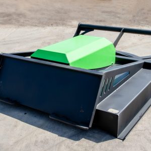 The ES 60" Standard Brush Cutter (up to 60HP) features a black, rectangular metal frame with a green angular cover on top, designed for robust and functional industrial use on concrete surfaces.